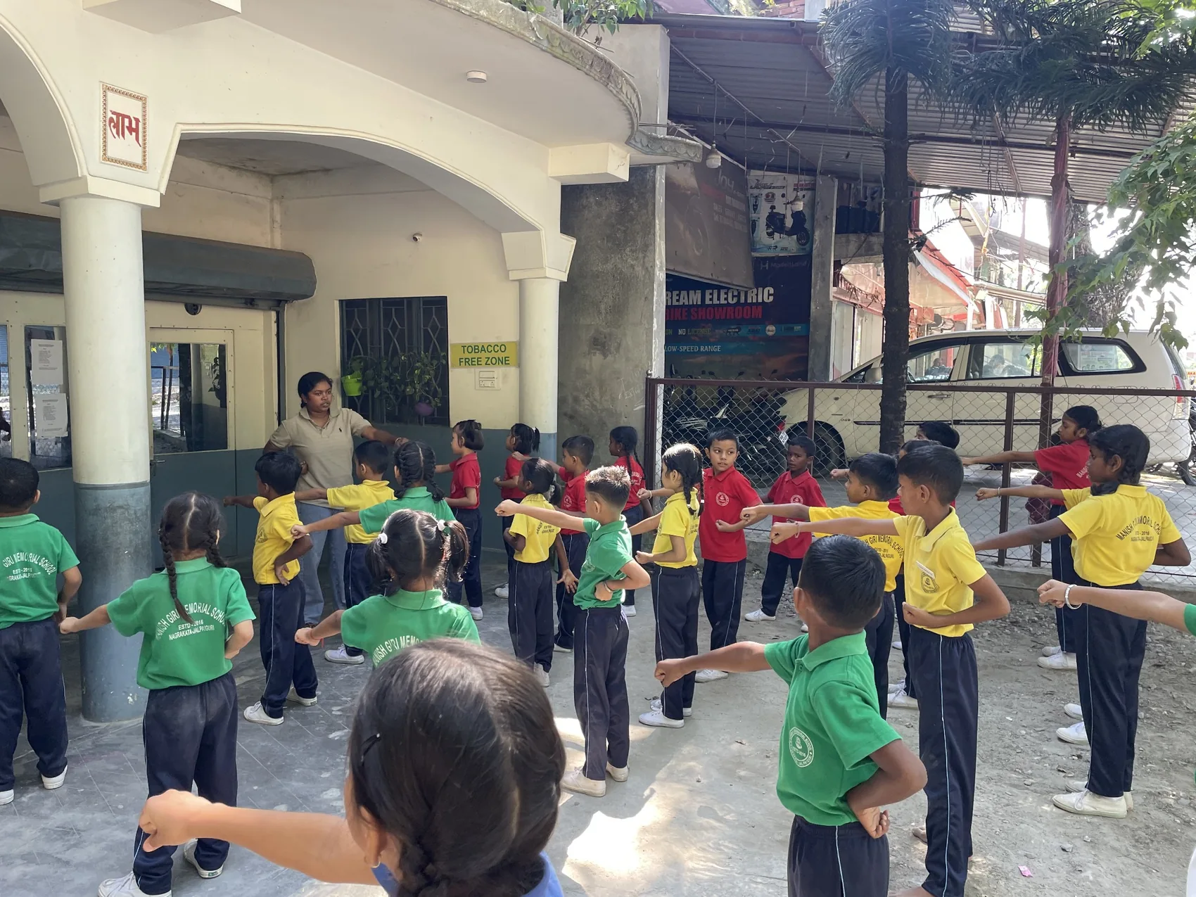 Children practising coordinated movement and physical exercise outside school